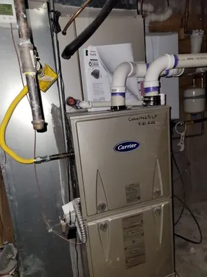 Ron McNitt Heating & Air Conditioning Logo