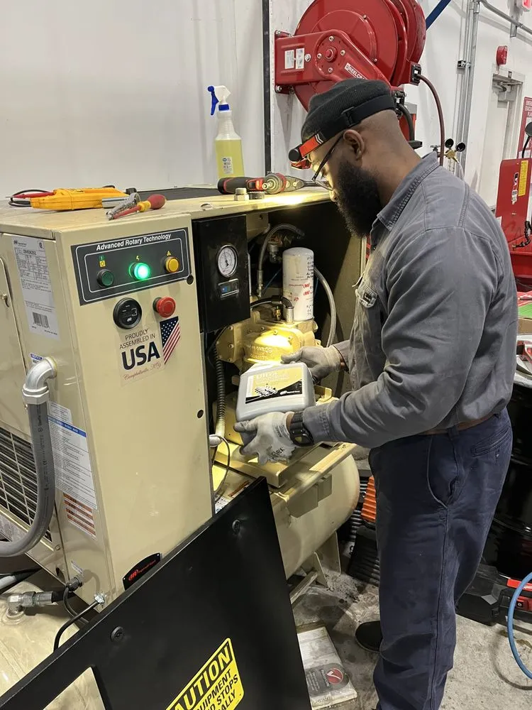 Slide of Rucker And Harrison Air Compressor Service