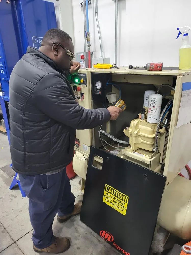 Slide of Rucker And Harrison Air Compressor Service