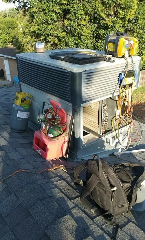 Slide of Russ Air Conditioning and Heating Services