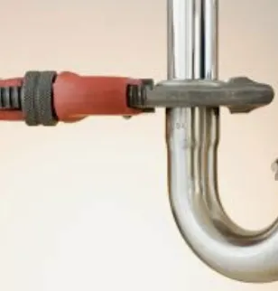 Scott E Plumbing Construction Repair Logo