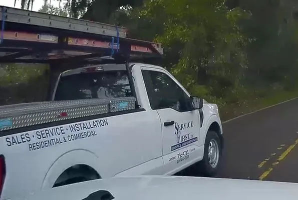 Service First Heating and Air Logo