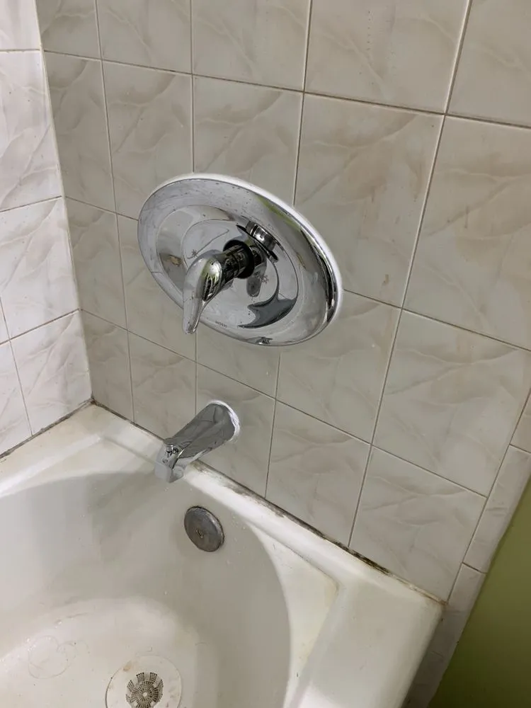 Slide of Service Tech Plumbing Heating &Cooling