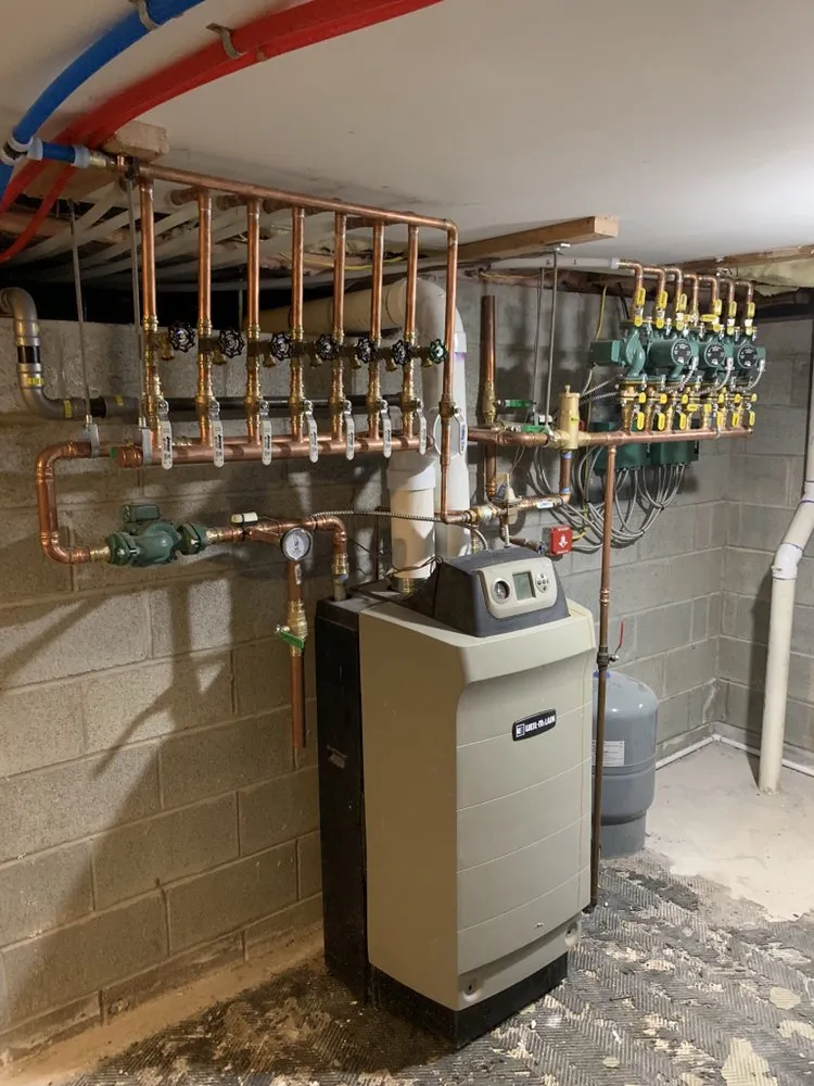 Slide of Service Tech Plumbing Heating &Cooling