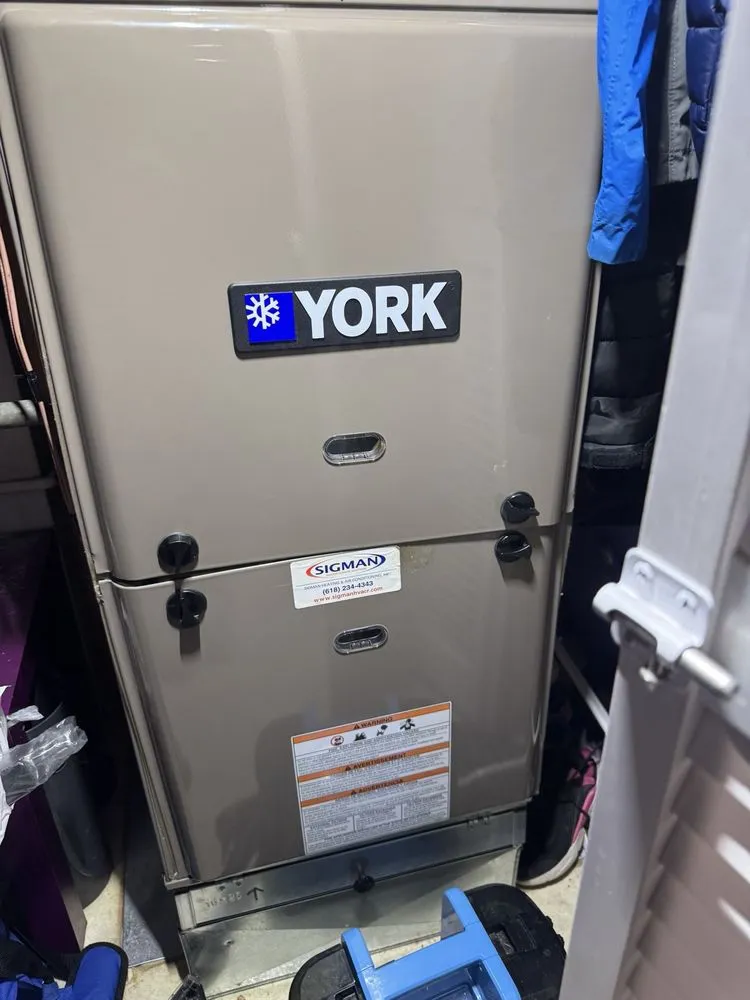 Slide of Sigman Heating and Air Conditioning