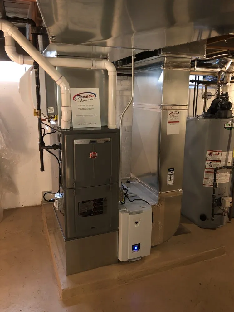 Slide of Signature Heating & Cooling