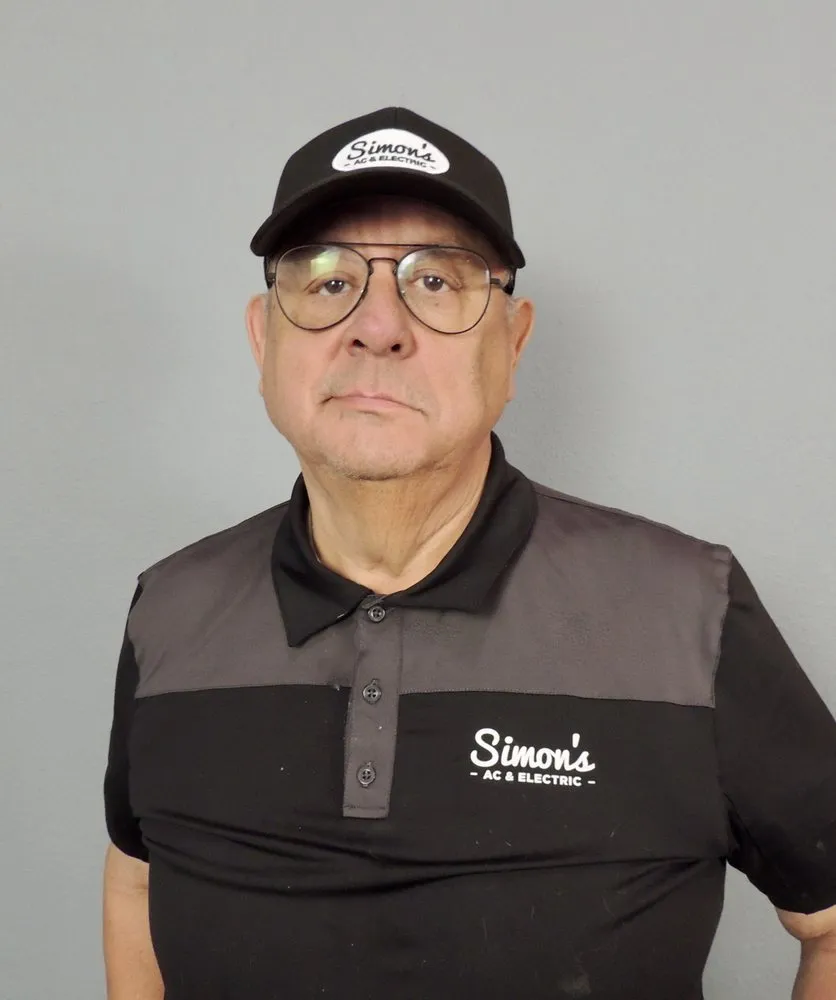 Slide of Simons AC & Electric