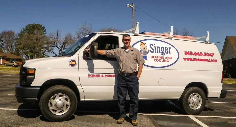 Slide of Singer Heating and Cooling