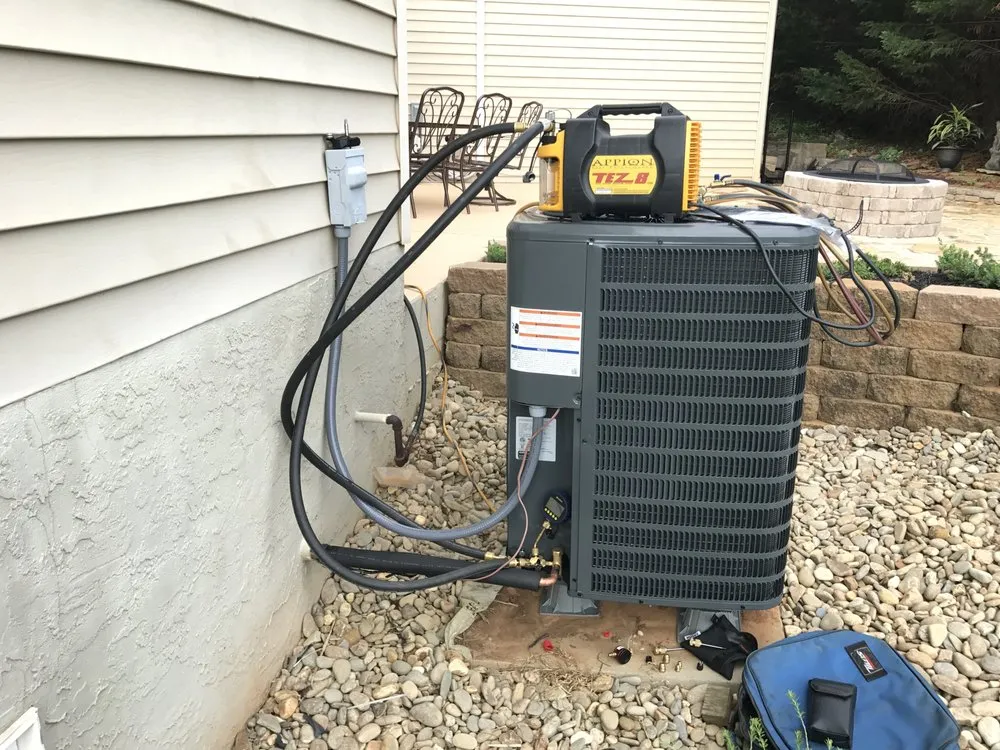 Slide of Singer Heating and Cooling