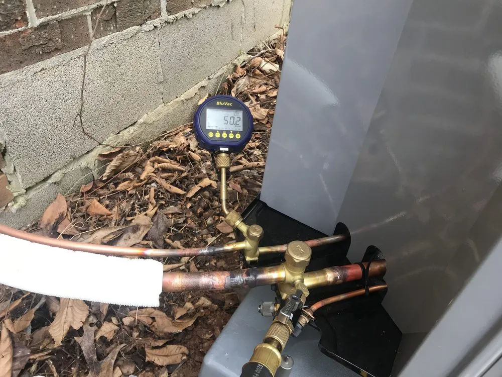 Slide of Singer Heating and Cooling