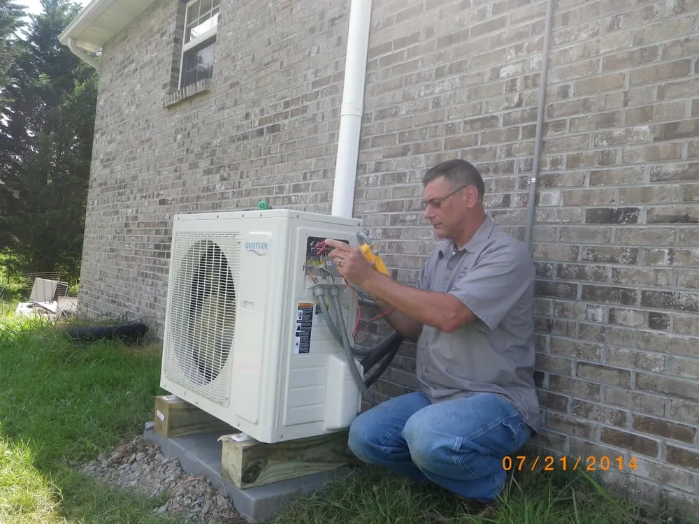 Slide of Singer Heating and Cooling