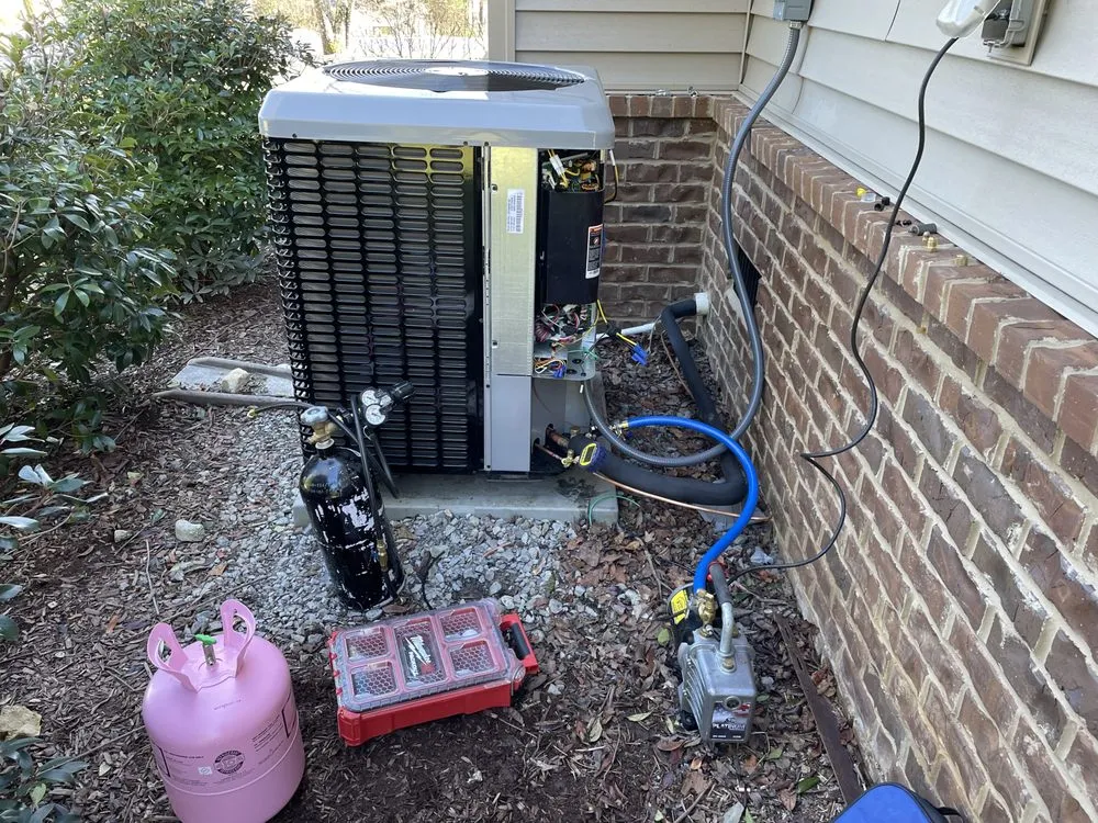 Slide of Singer Heating and Cooling