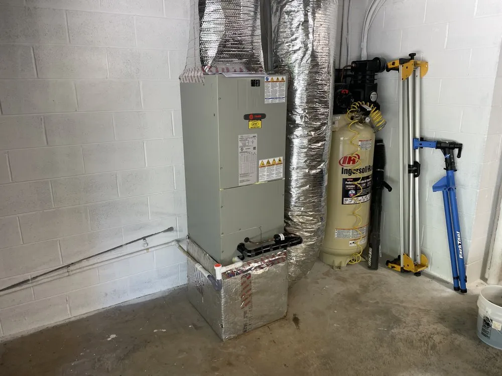 Slide of Singer Heating and Cooling