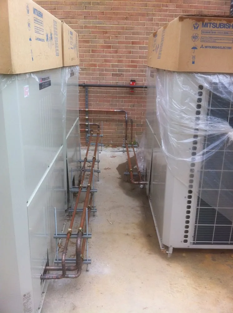 Slide of SJ Plumbing and Mechanical Building Services