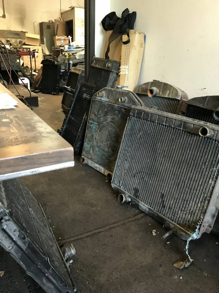 Slide of Spike Radiator & Air Conditioner Repair