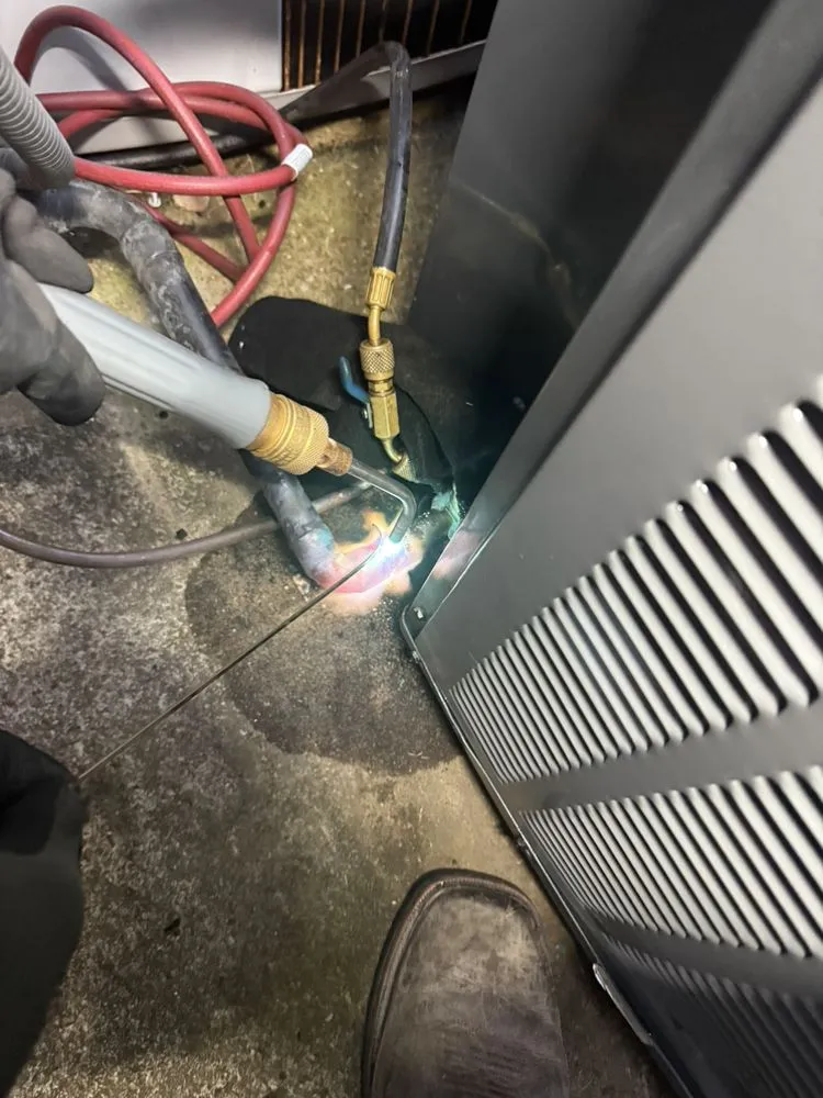 Slide of S&T Heat & Air