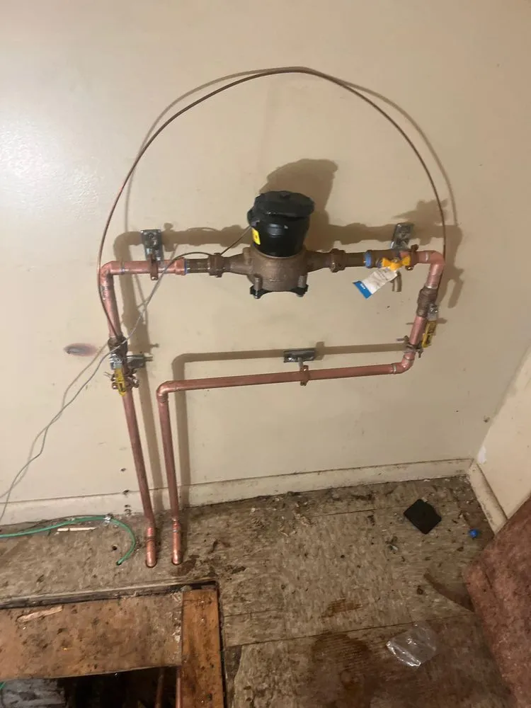 Slide of Stanley Lewis Plumbing and Heating