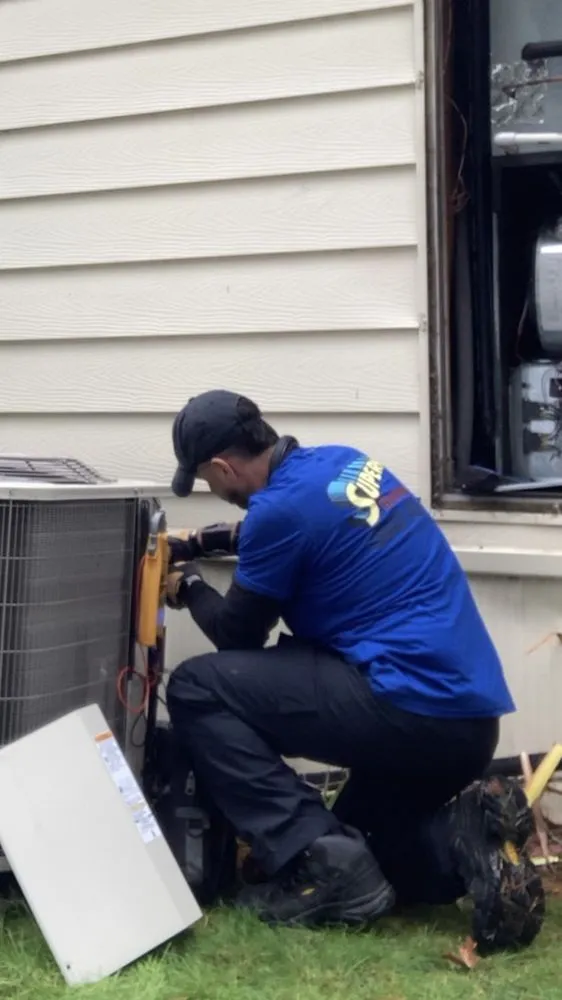 Slide of Supermen Heating & Air