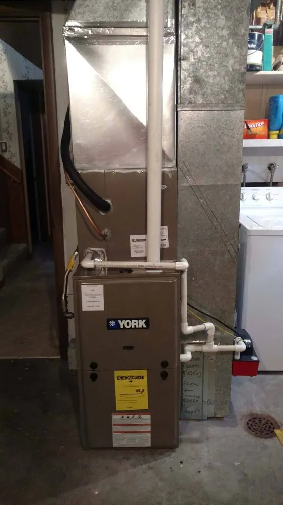 Slide of T & T Heating and Cooling