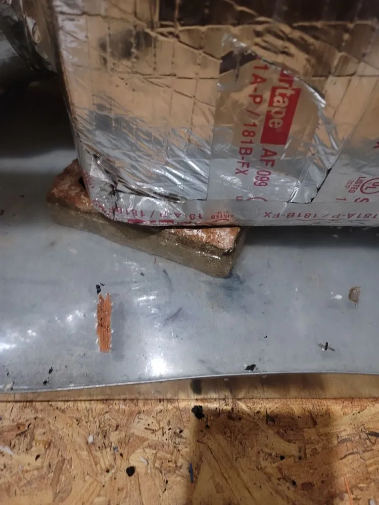 Slide of T and M Heating and Air