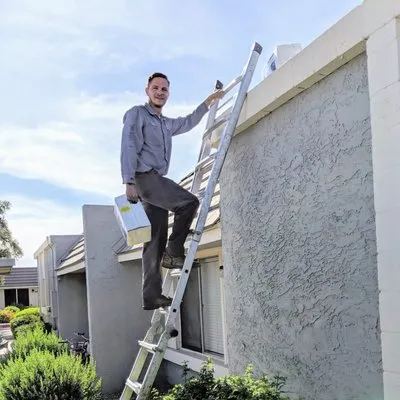 Tate's A/C Heating & Cooling Logo