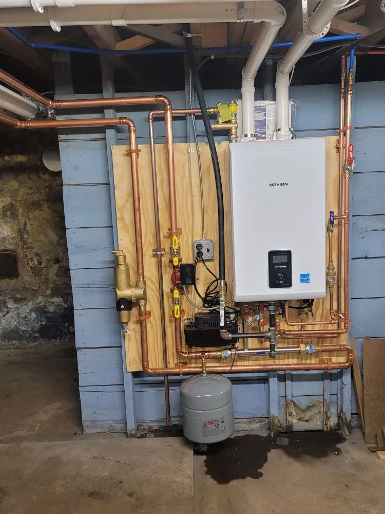 Slide of T&E Plumbing and Heating