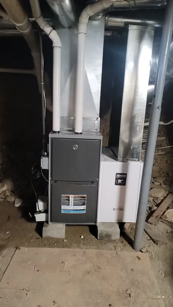 Slide of T&E Plumbing and Heating