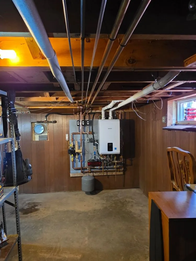 Slide of T&E Plumbing and Heating