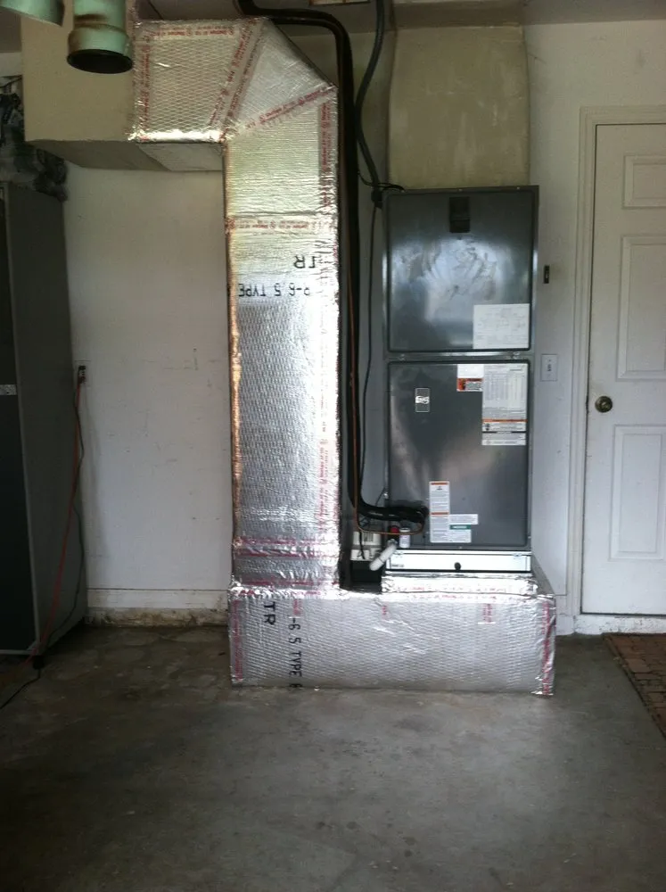 Slide of The A/C Guy