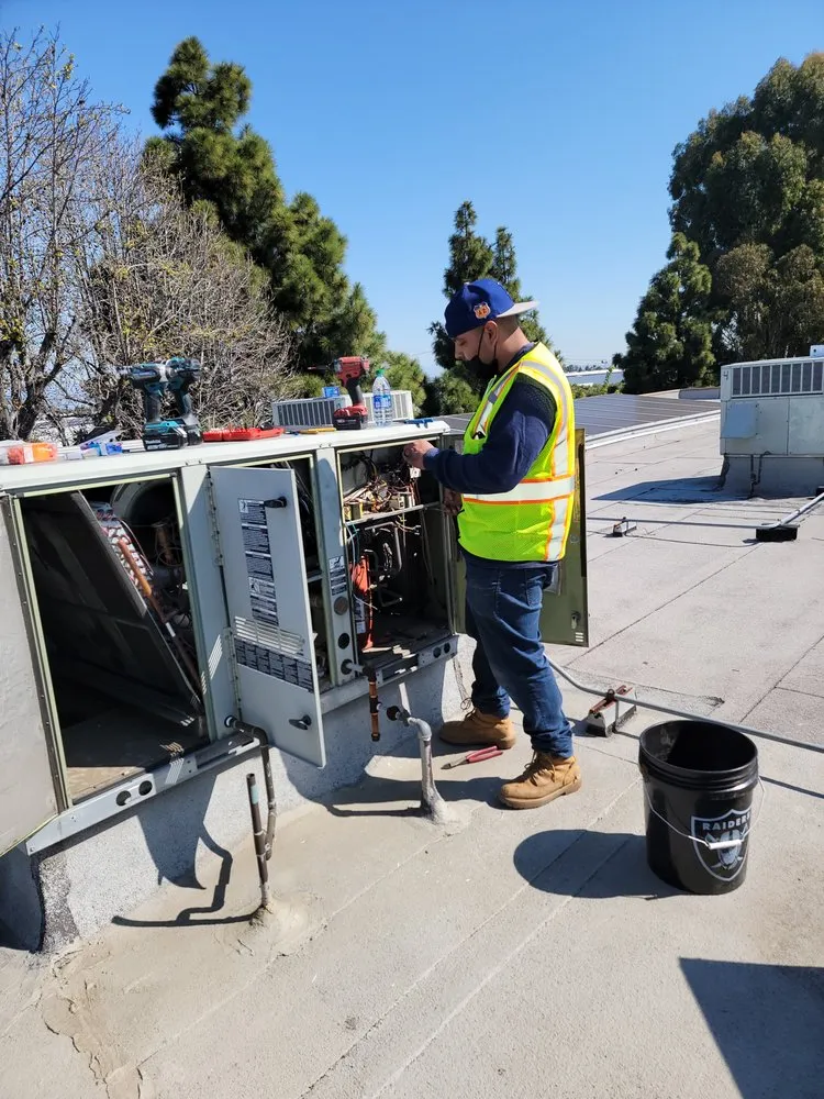 Slide of The AC Guy Services