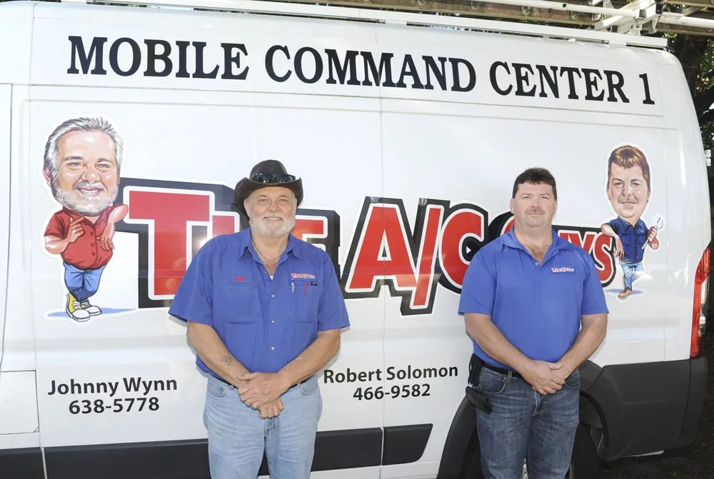 Slide of The A/C Guys