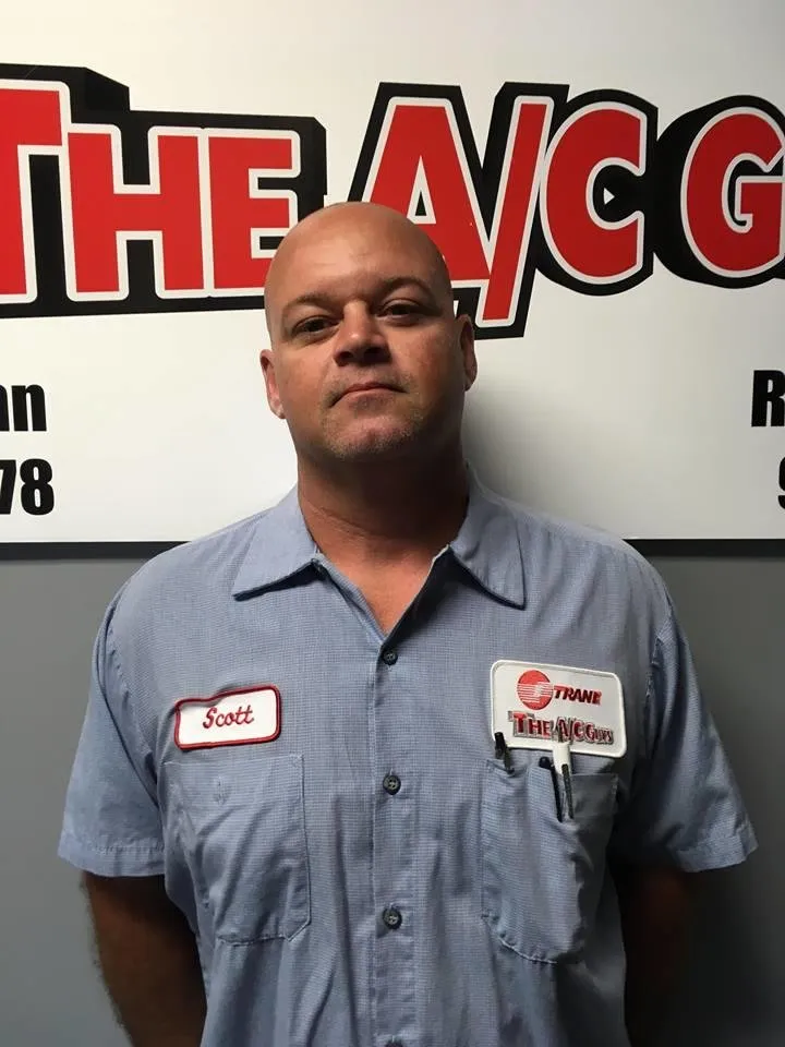 Slide of The A/C Guys