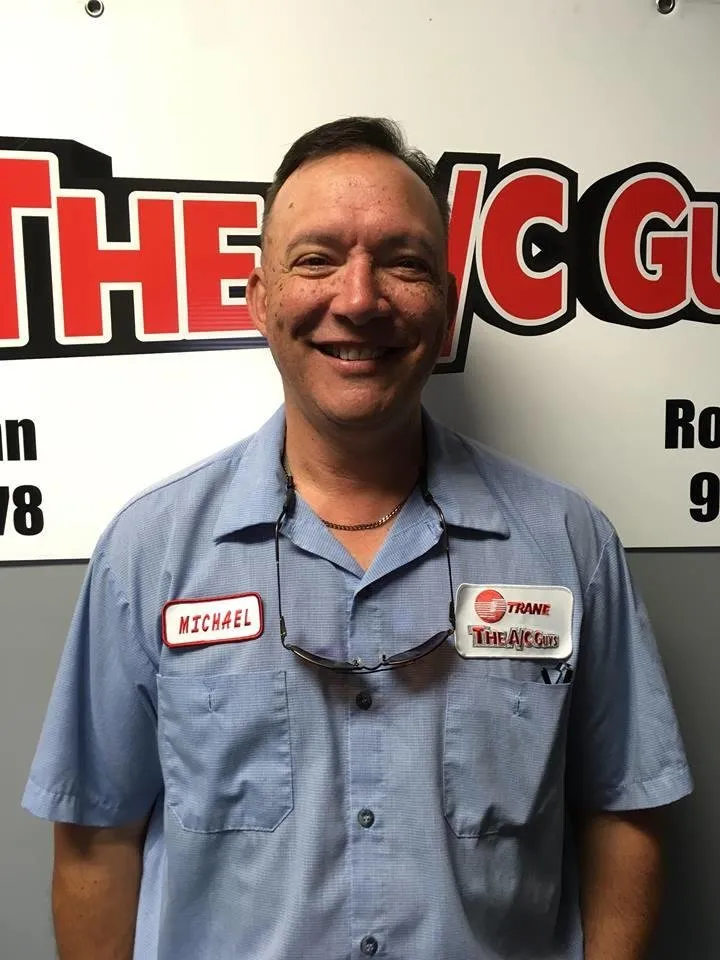 Slide of The A/C Guys