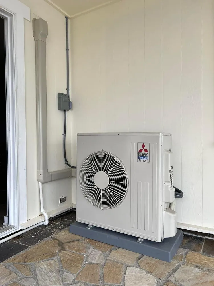 Slide of The AC Guys