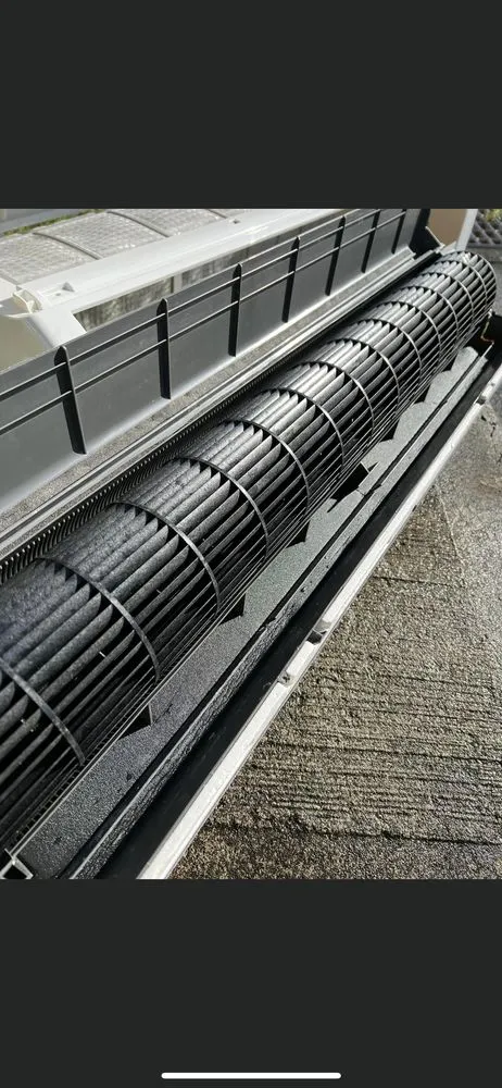 Slide of The AC Guys