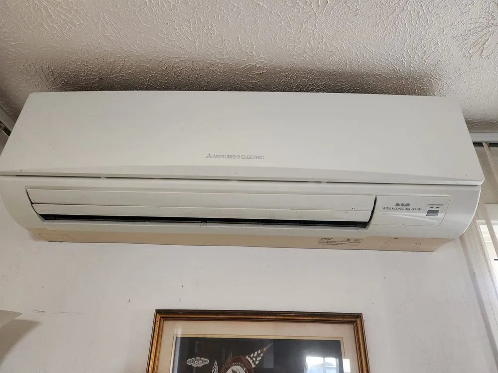 Slide of The AC Guys