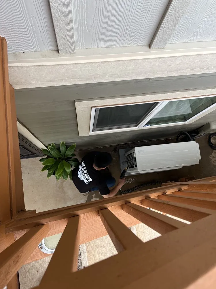 Slide of The AC Guys