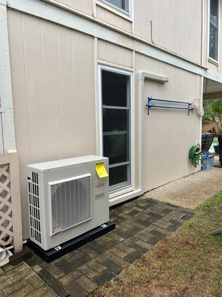 Slide of The AC Guys