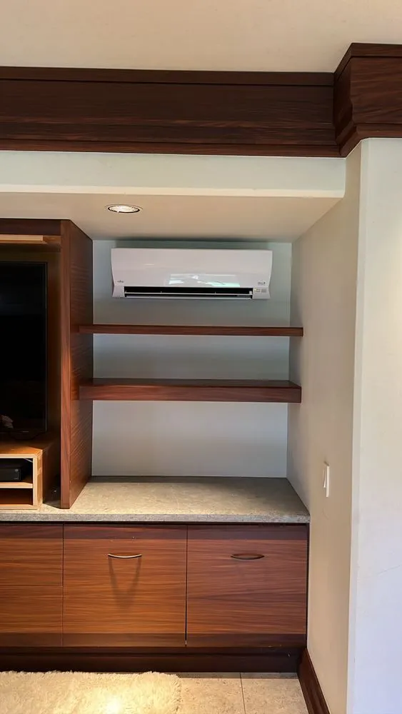 Slide of The AC Guys