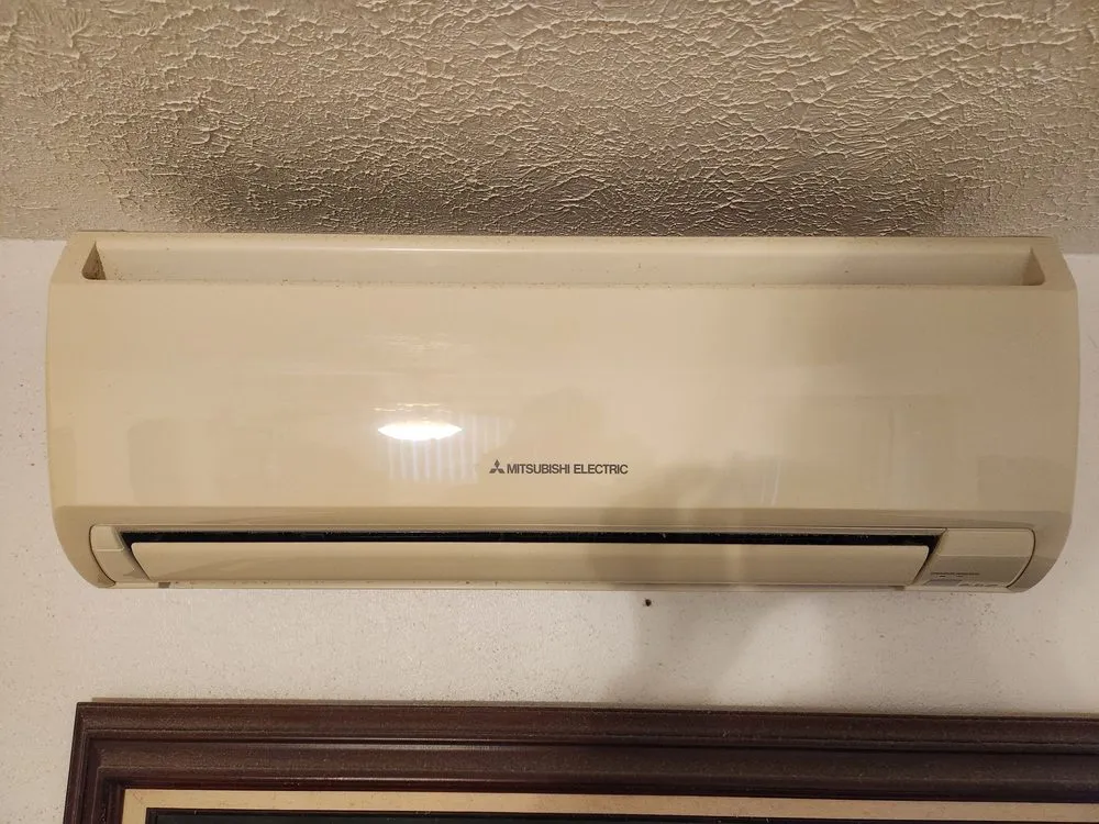 Slide of The AC Guys