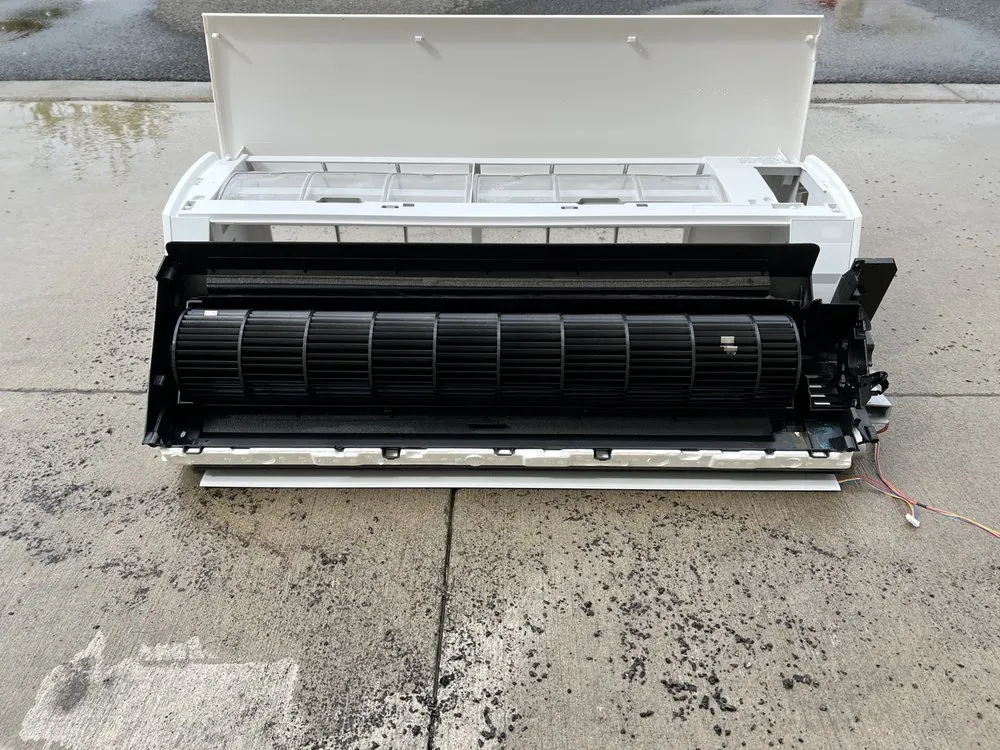 Slide of The AC Guys