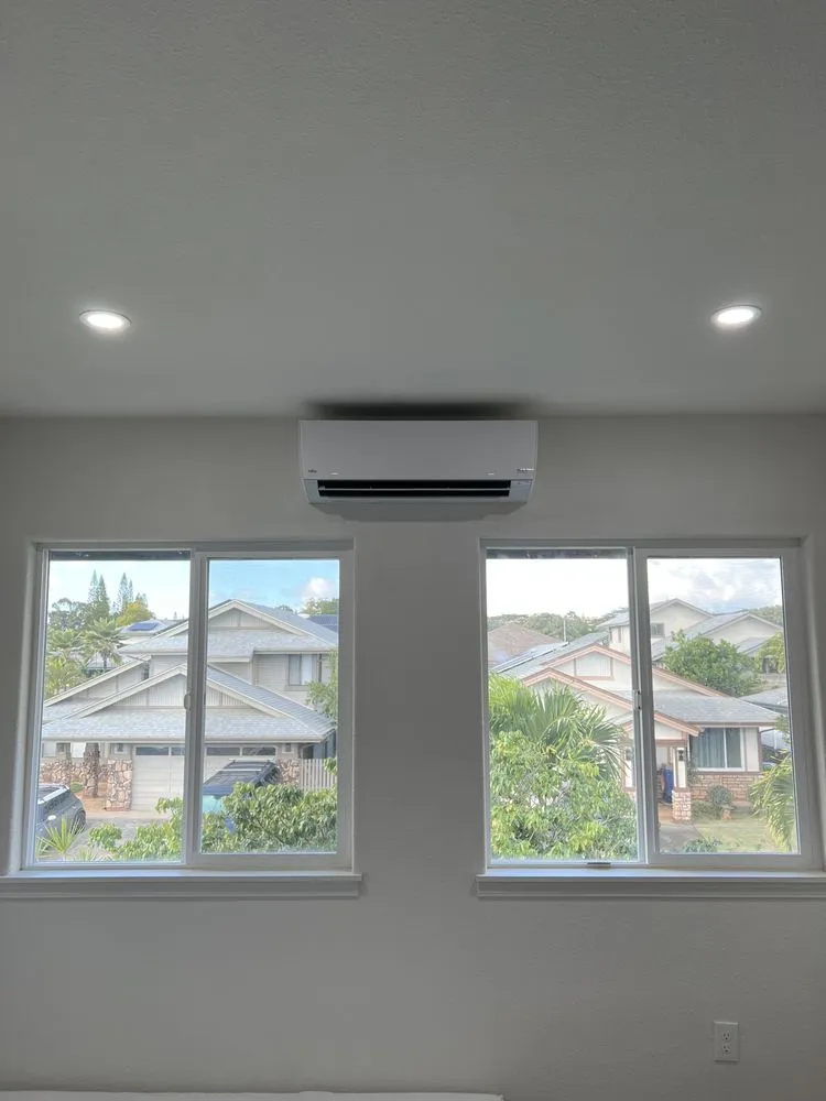 Slide of The AC Guys