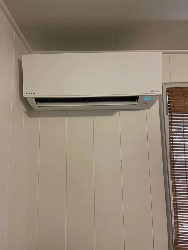 Slide of The AC Guys