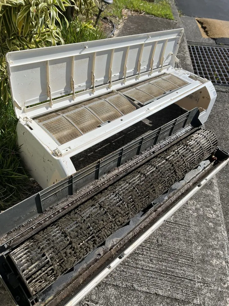 Slide of The AC Guys