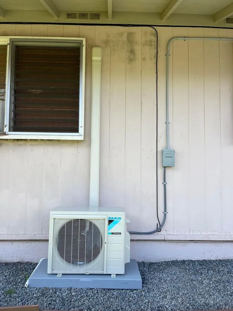 Slide of The AC Guys