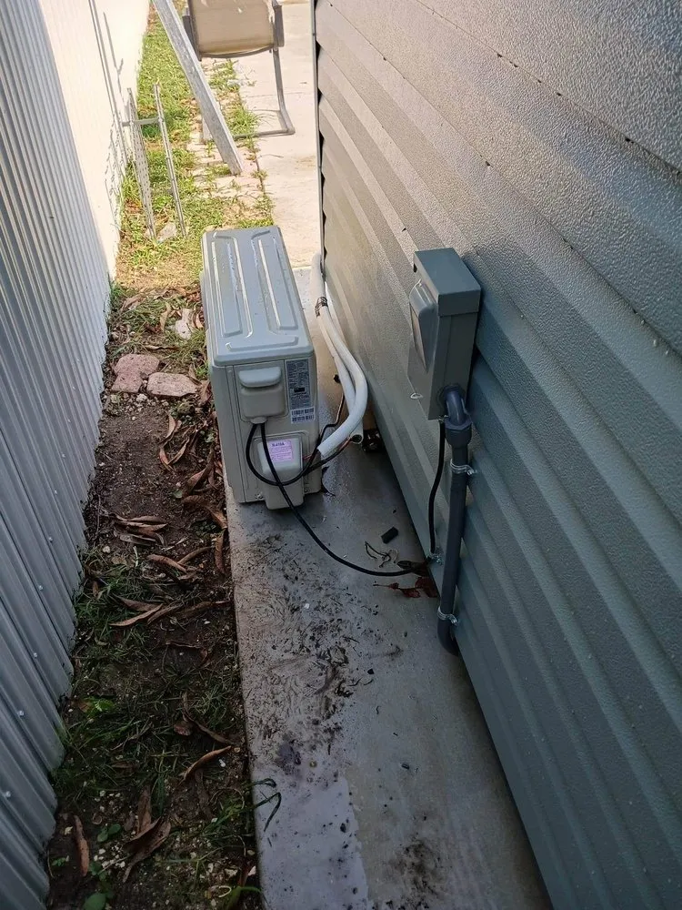 Slide of The AC Guys