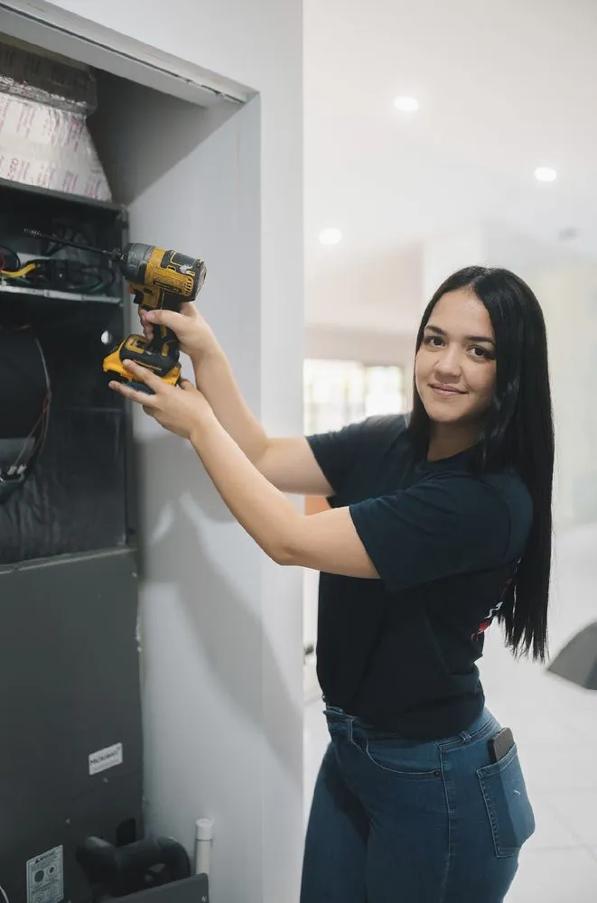 Slide of The AC Guys