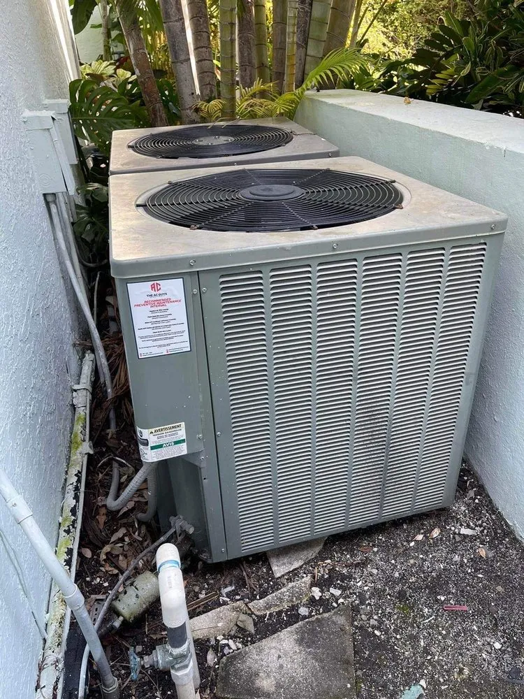 Slide of The AC Guys