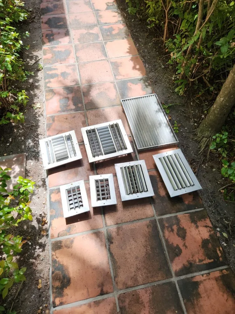 Slide of The AC Guys