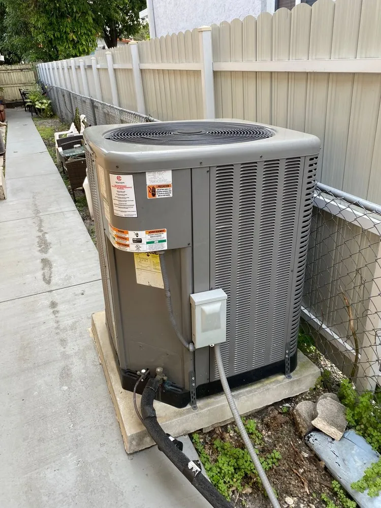 Slide of The AC Guys